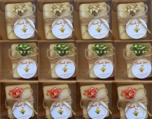 Packaged soaps with decorative elements with 'Thank You' labels 