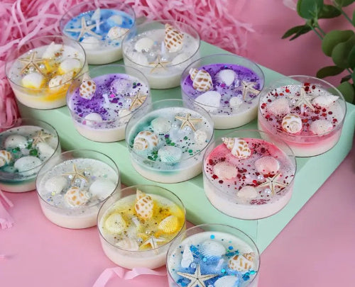 Assorted small containers with decorative contents 