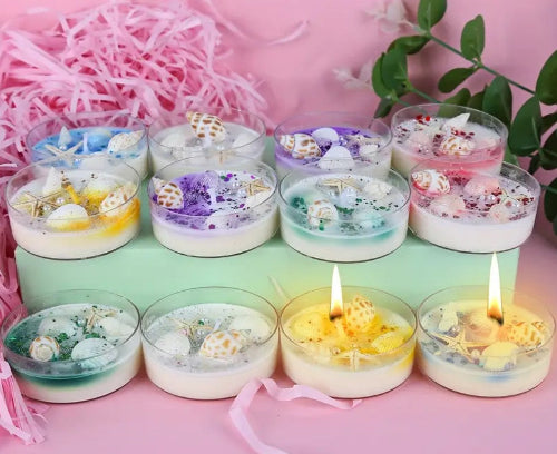 Decorative candles in small containers 